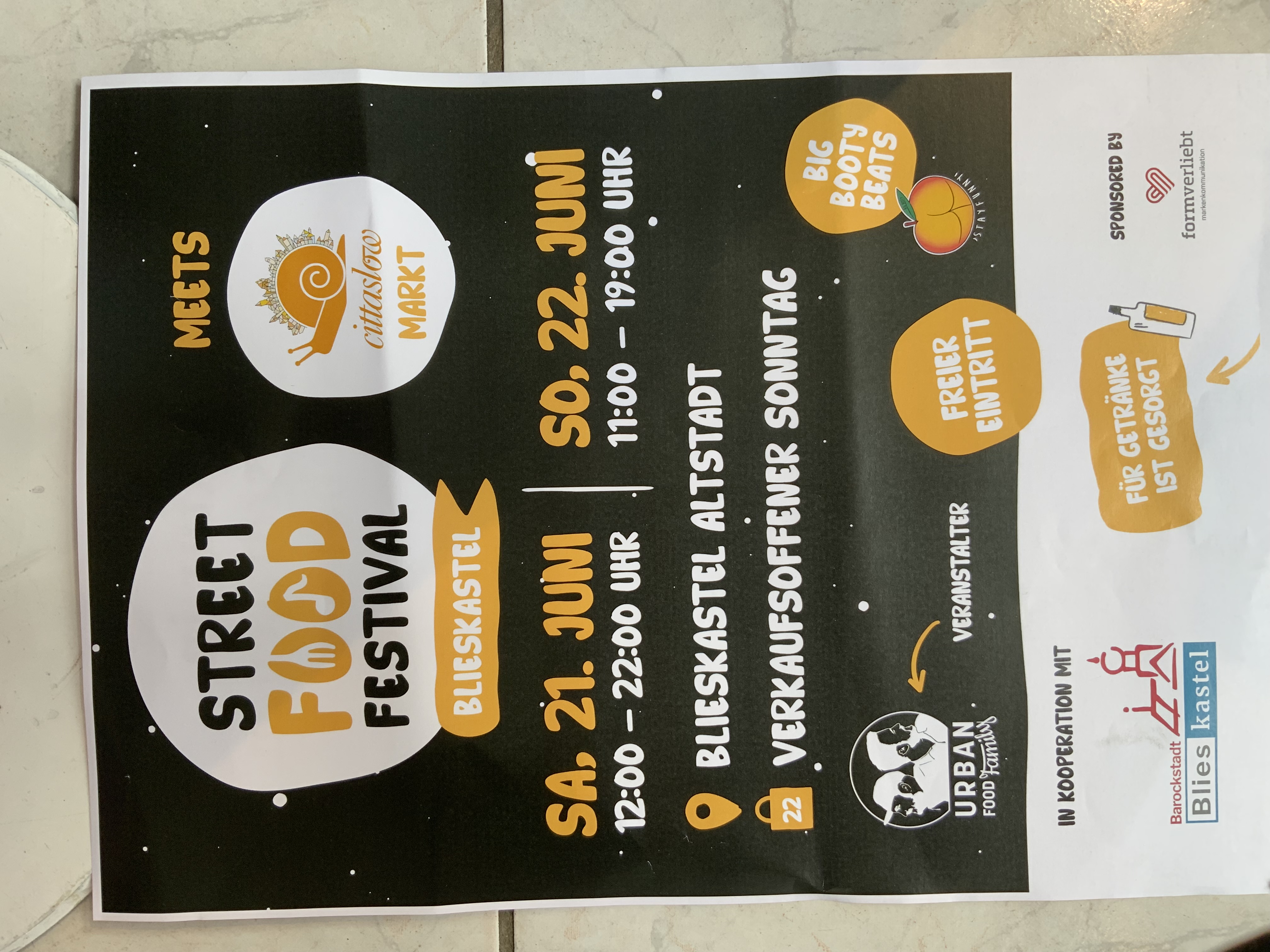 Ein Flyer für ein Street Food Festival in Blieskastel mit bunten Grafiken.